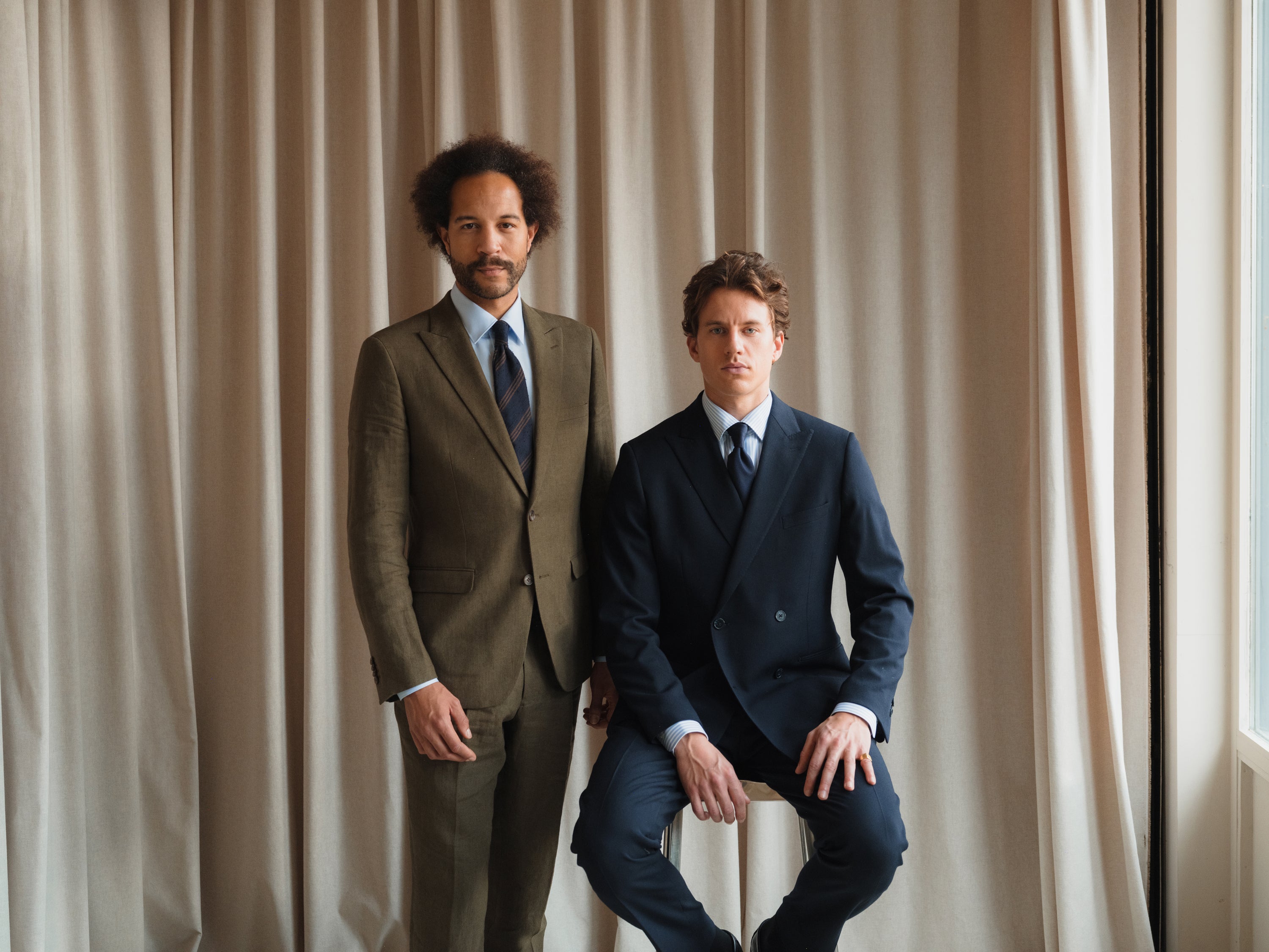 Tailored suits in a variety of colors and patterns, designed for business, weddings, and formal occasions.