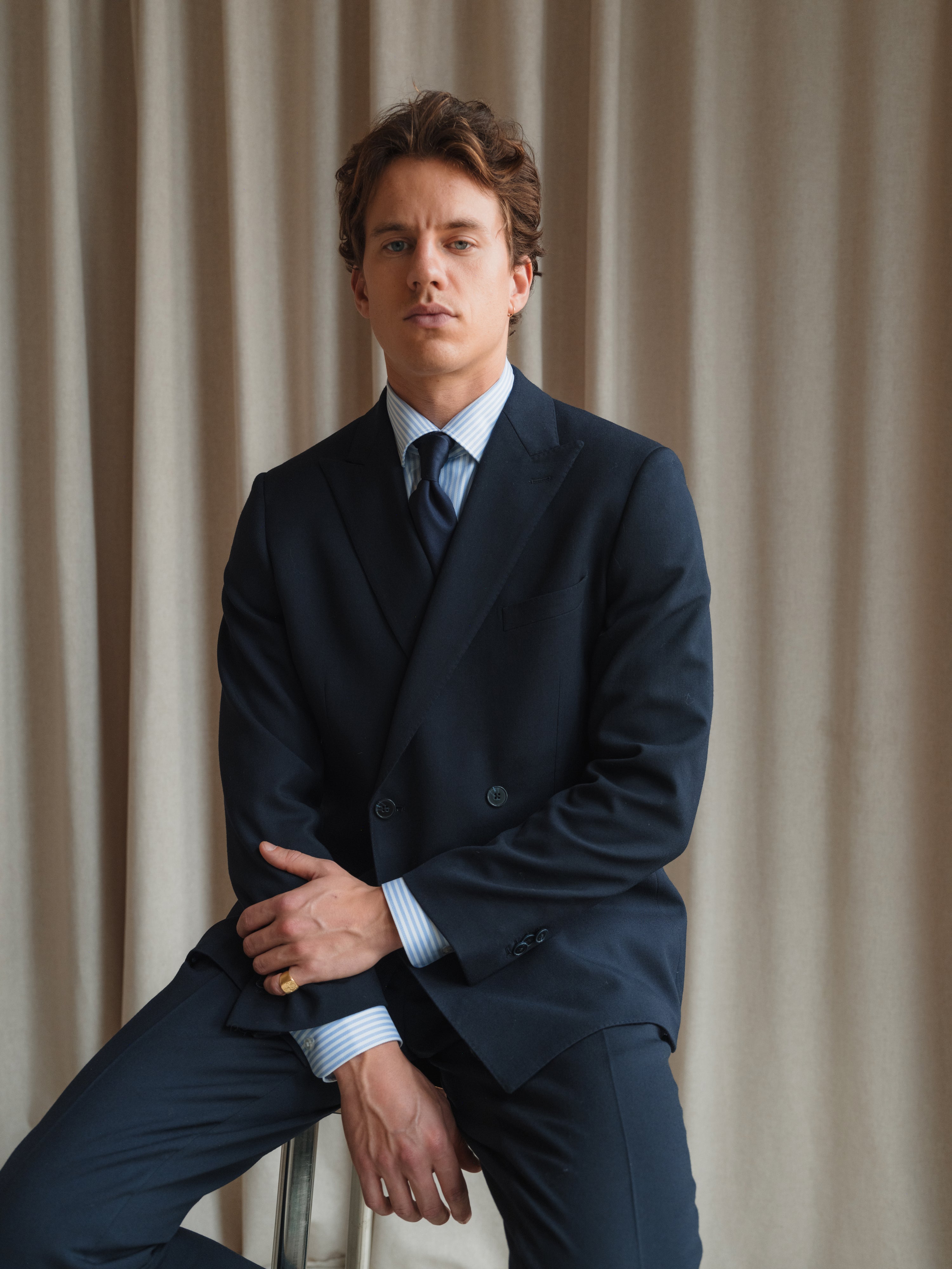 A showcase of tailored menswear, highlighting expert craftsmanship and diverse styling options.