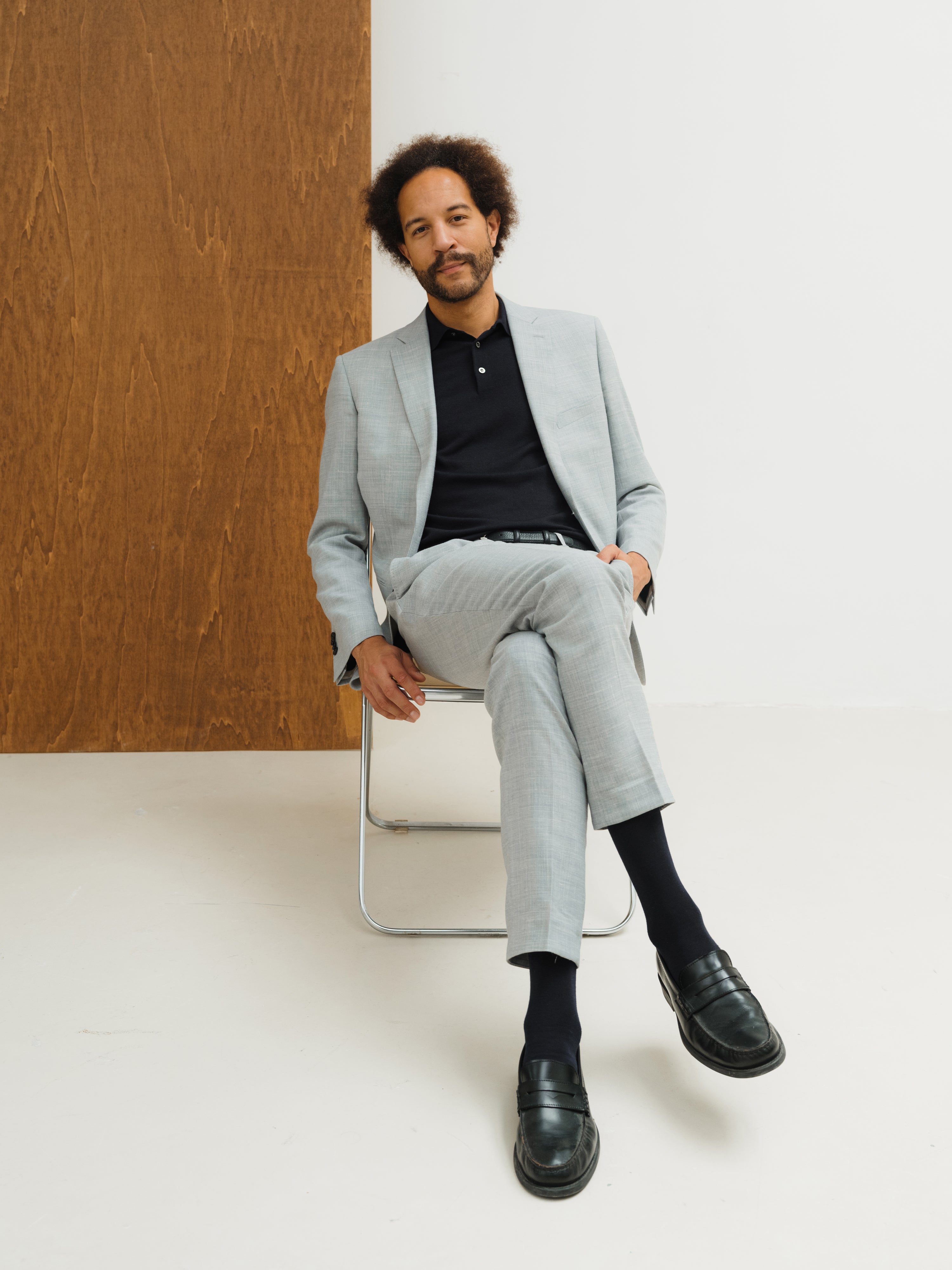 A showcase of tailored menswear, highlighting expert craftsmanship and diverse styling options.