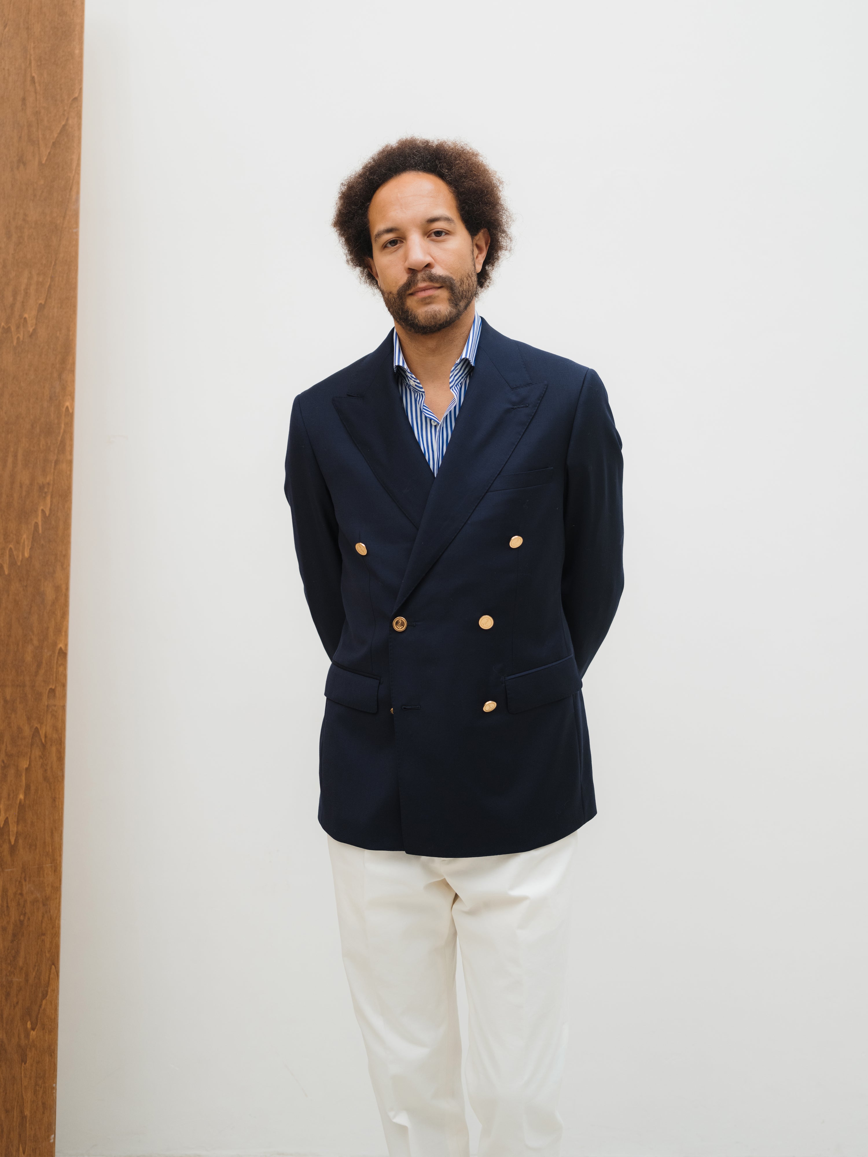 Custom-made suits in rich textures and shades, crafted with precision at Atelier ACÀN in Antwerp and Ghent.