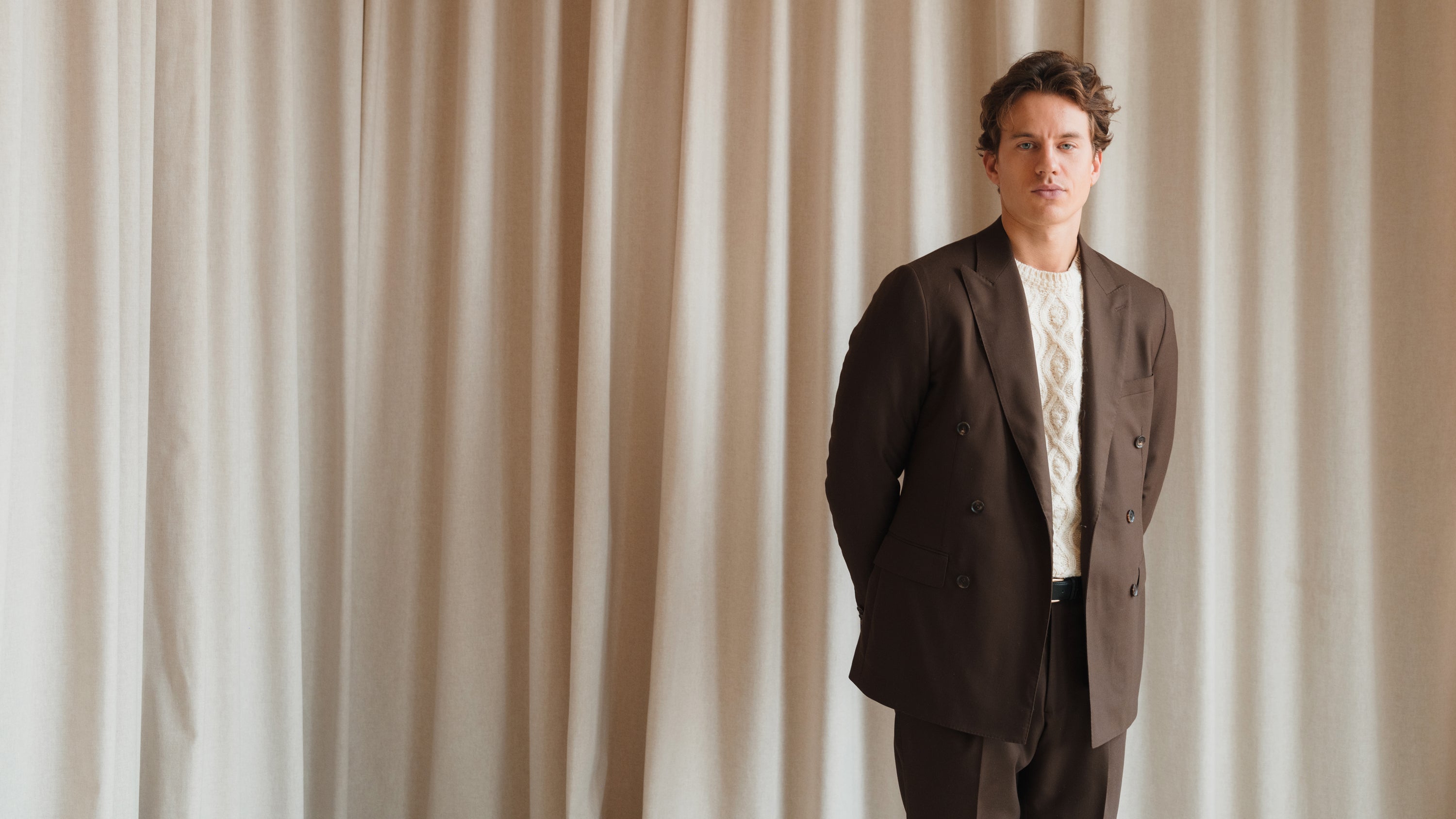 Bespoke suits in a variety of colors and styles, tailored by Atelier ACÀN in Antwerp and Ghent.
