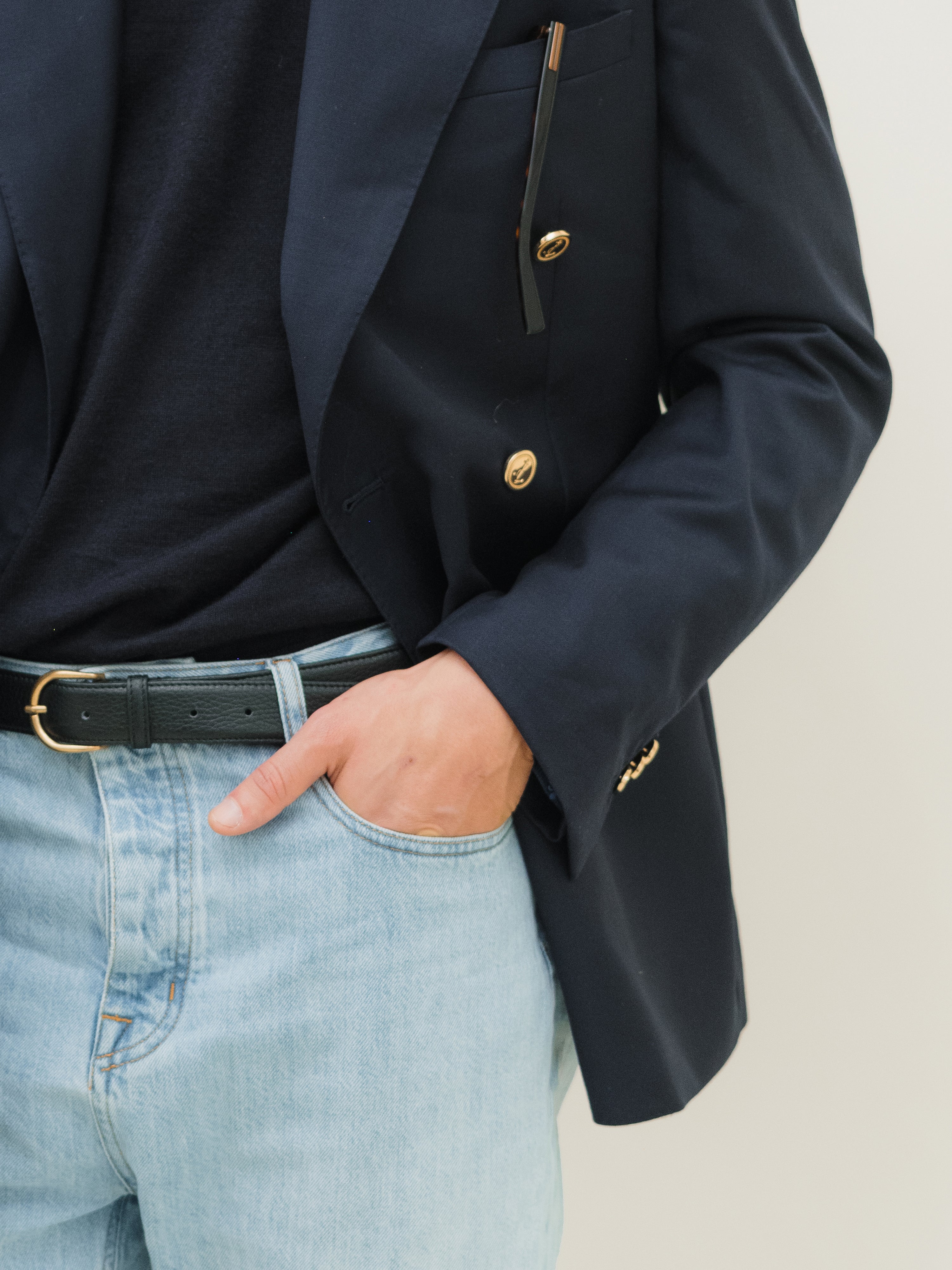 Tailored suits in a variety of colors and patterns, designed for business, weddings, and formal occasions.