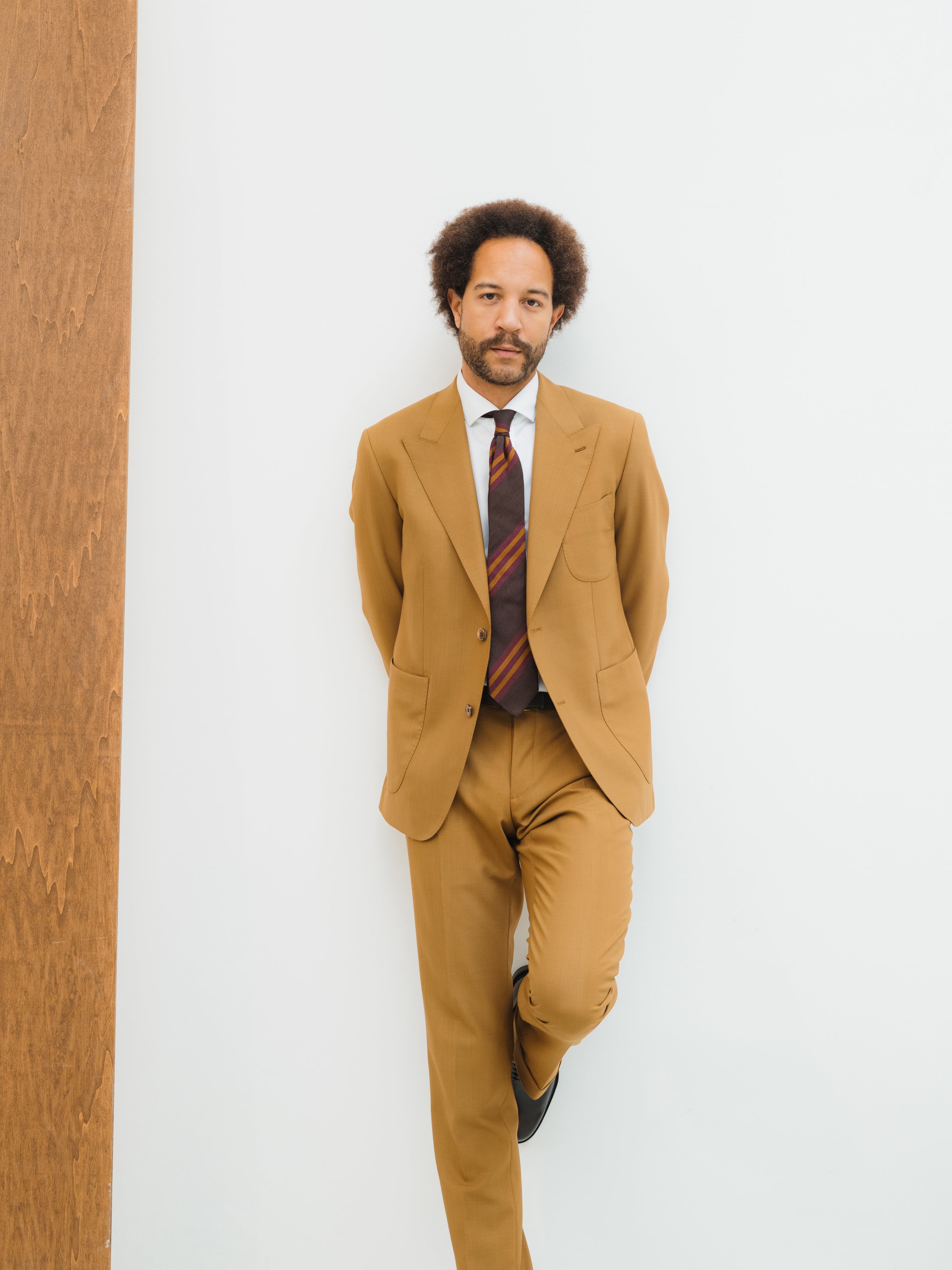Bespoke suits in classic and modern designs, hand-tailored for a perfect fit.