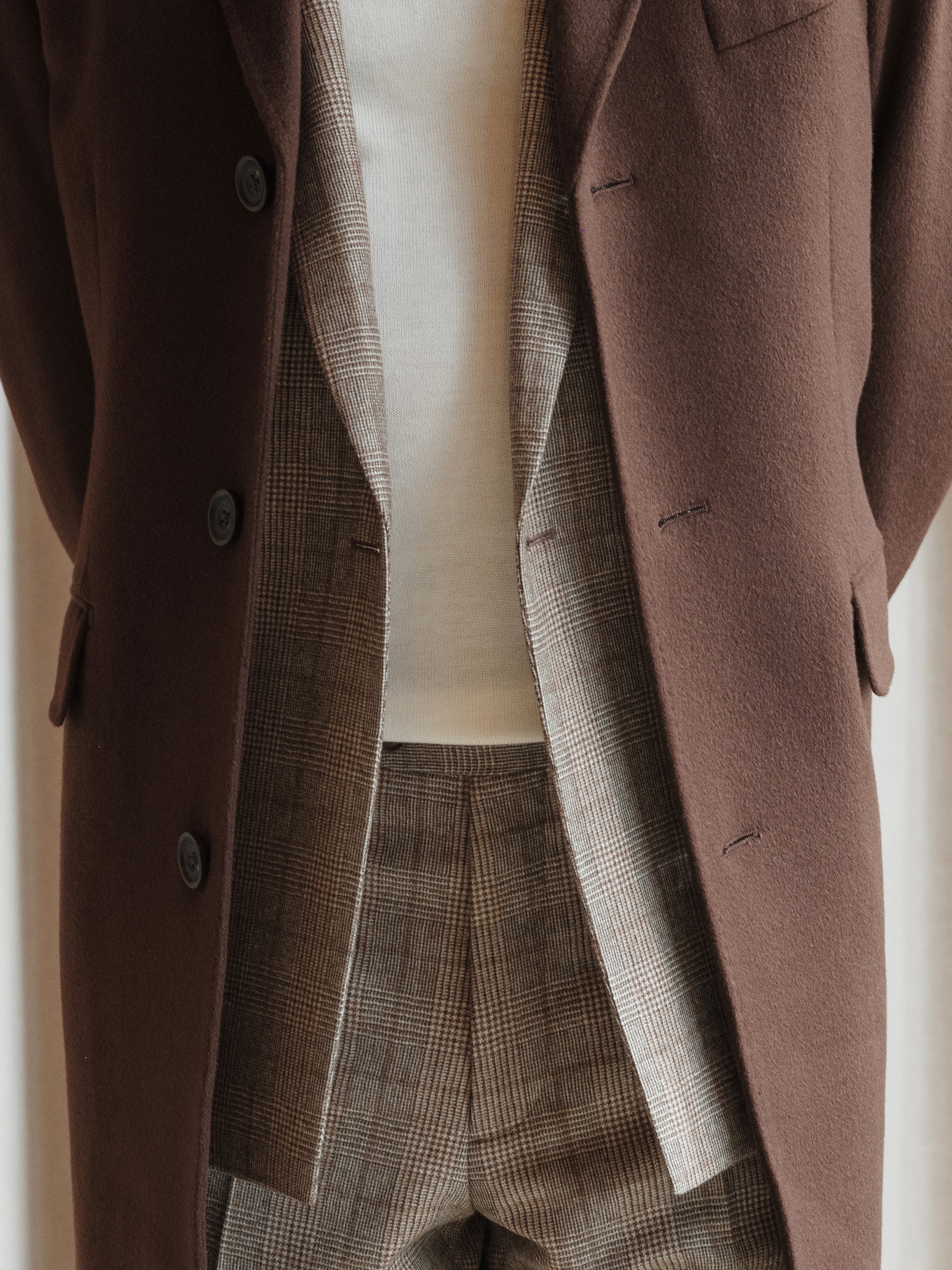 Suits, crafted and available at Atelier ACÀN in Ghent and Antwerp.