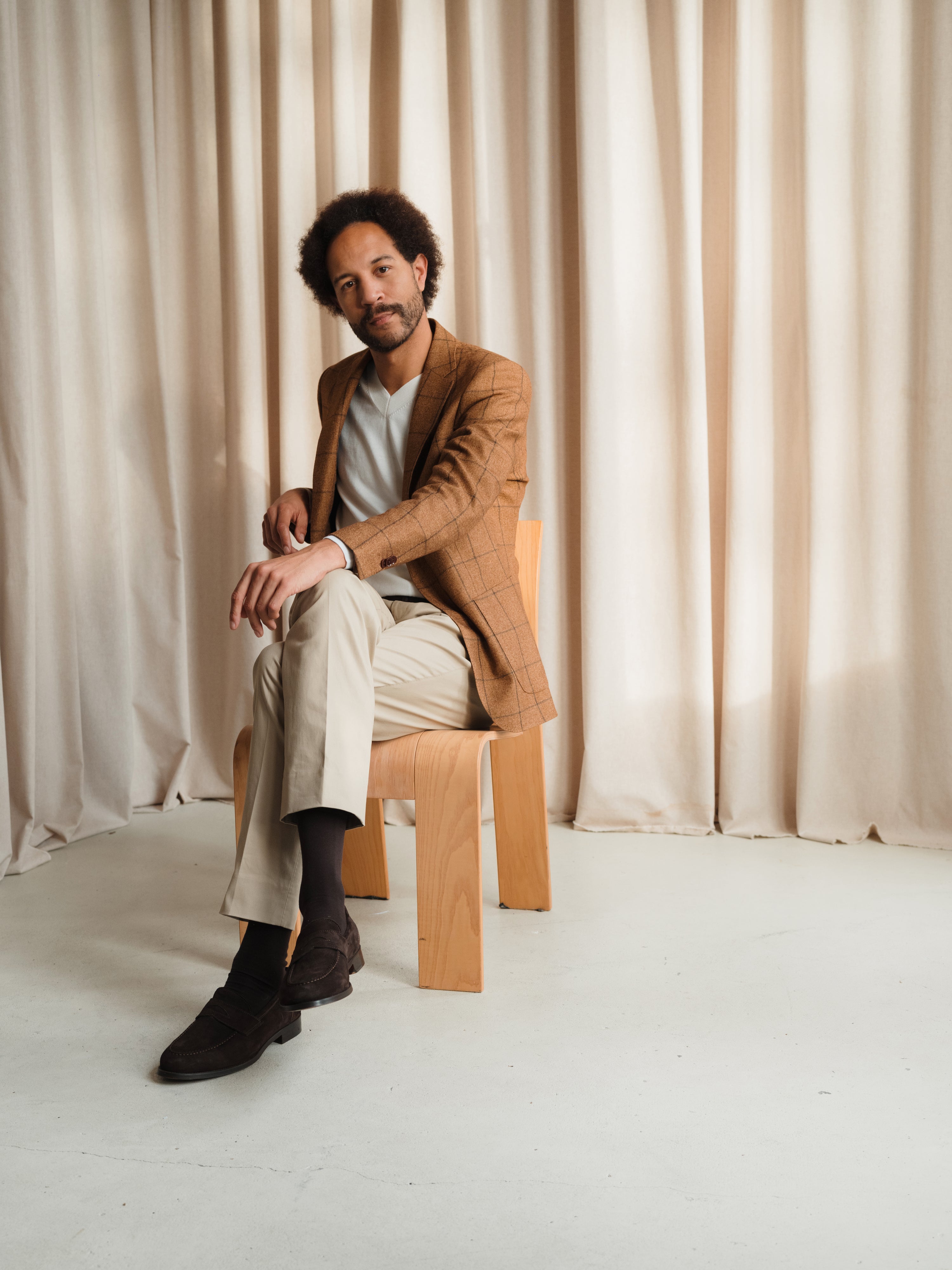 A showcase of tailored menswear, highlighting expert craftsmanship and diverse styling options.